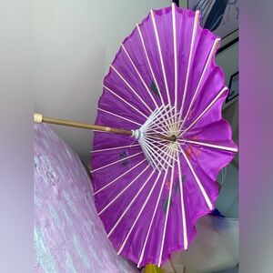 Bamboo Umbrellas Available colors pink, green, orange,red, white, purple.
